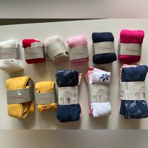 New with tags baby girl and baby boy clothes.